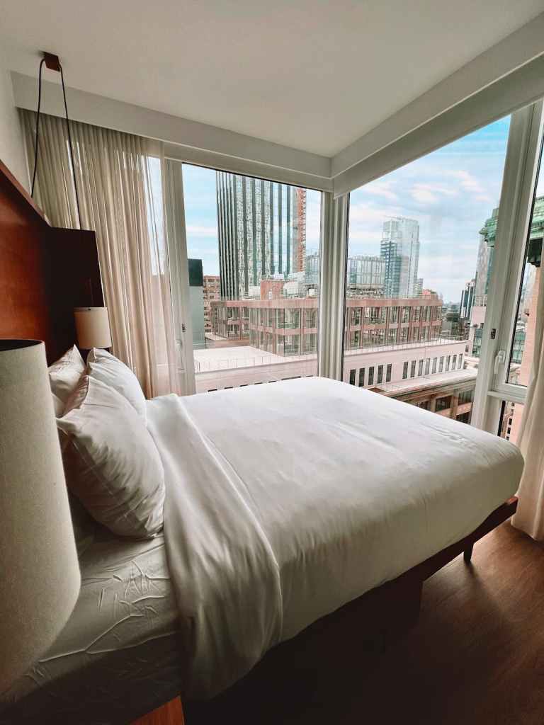 modern hotel room with cityscape view