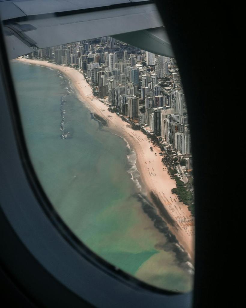 view of recife coastline in brazil from an airplane window